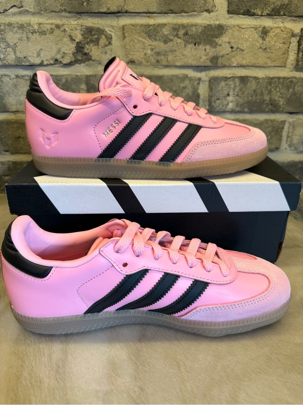 Messi kids adidas Pink Low-Top Sneakers with Black Stripes